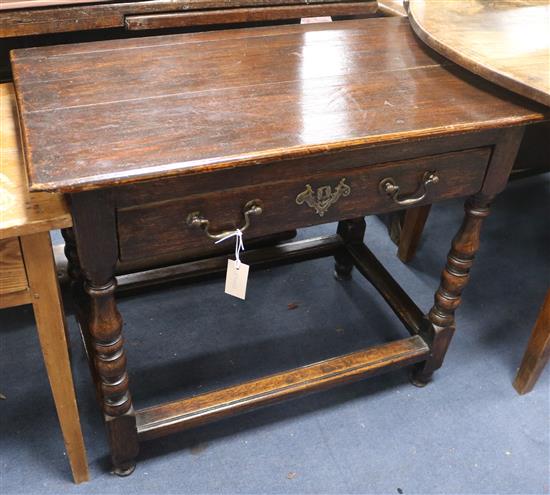 An 18th century and later oak side table W.85cm